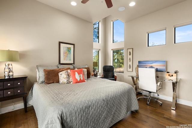 bedroom with ceiling fan, dark wood-style flooring, recessed lighting, and baseboards