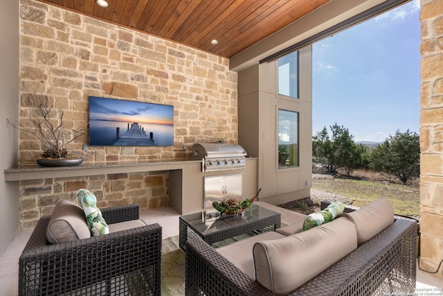 view of patio featuring an outdoor kitchen, grilling area, and outdoor lounge area