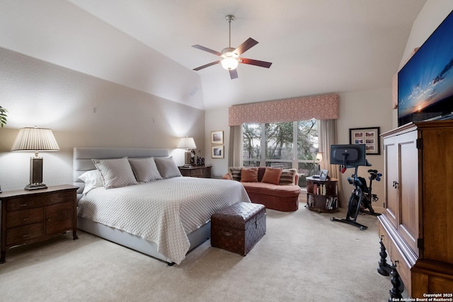 bedroom with light carpet, ceiling fan, and high vaulted ceiling