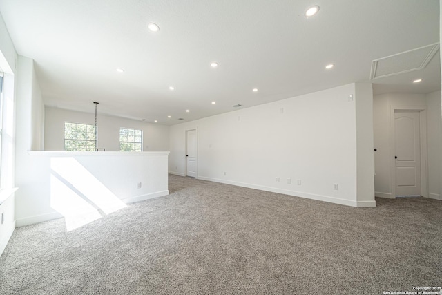 empty room with recessed lighting, baseboards, and light colored carpet