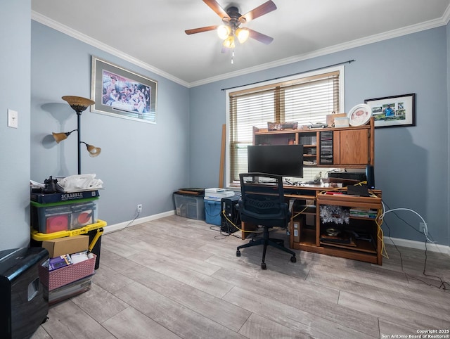 office area with light wood finished floors, a ceiling fan, baseboards, and crown molding