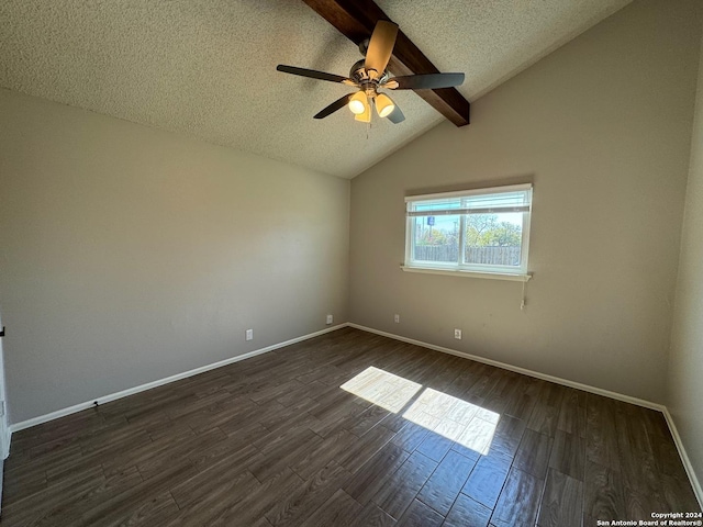 spare room featuring vaulted ceiling with beams, ceiling fan, a textured ceiling, baseboards, and dark wood finished floors