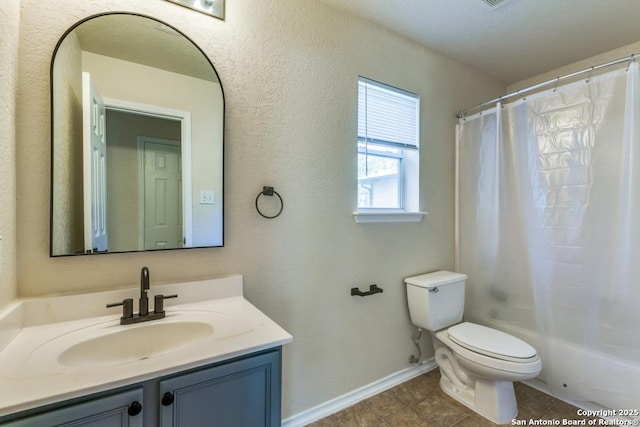 full bath featuring baseboards, toilet, shower / tub combo with curtain, tile patterned flooring, and vanity