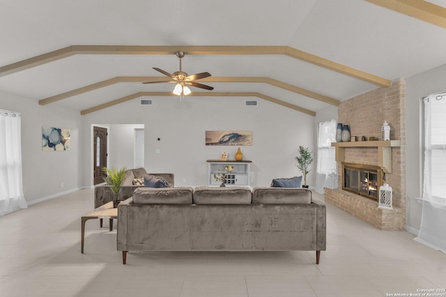 living area with a ceiling fan, a brick fireplace, visible vents, and vaulted ceiling with beams