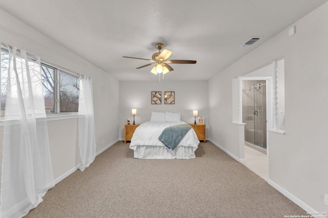 bedroom featuring connected bathroom, light carpet, a ceiling fan, visible vents, and baseboards