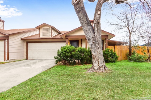 view of front of property with a garage, driveway, a front lawn, and fence