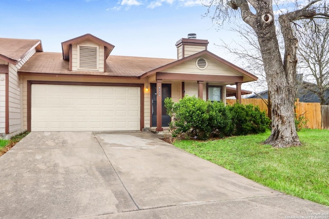 view of front of house featuring a chimney, concrete driveway, fence, a garage, and a front lawn