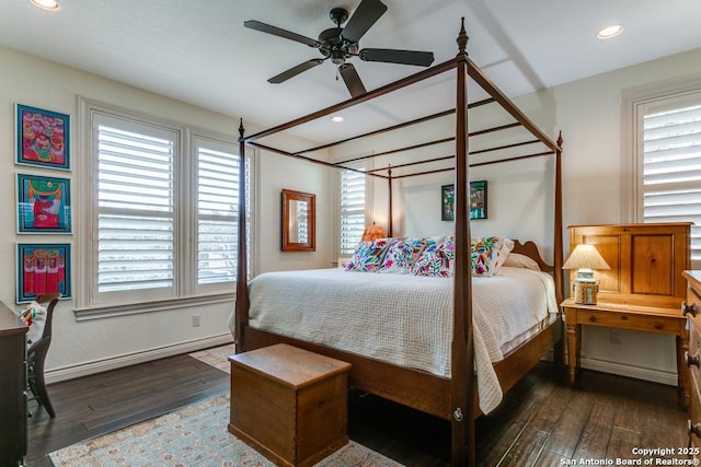 bedroom featuring baseboards, multiple windows, dark wood finished floors, and recessed lighting