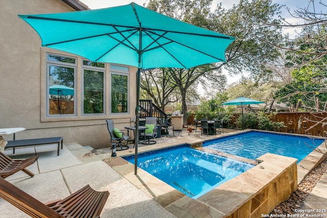 view of pool featuring a fenced in pool, outdoor dining area, a patio, fence, and an in ground hot tub