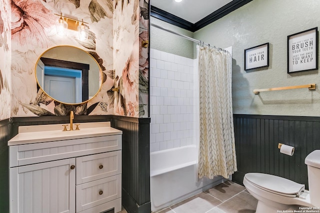 bathroom featuring crown molding, shower / bath combination with curtain, toilet, wainscoting, and tile patterned floors