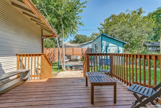 wooden deck featuring fence