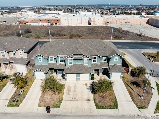 drone / aerial view with a residential view