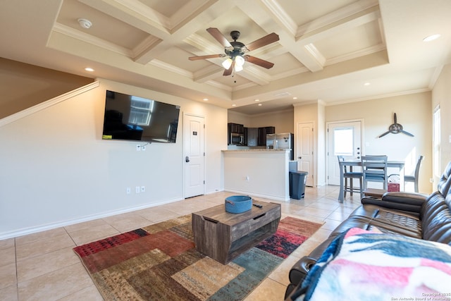 living area with beam ceiling, coffered ceiling, and light tile patterned floors