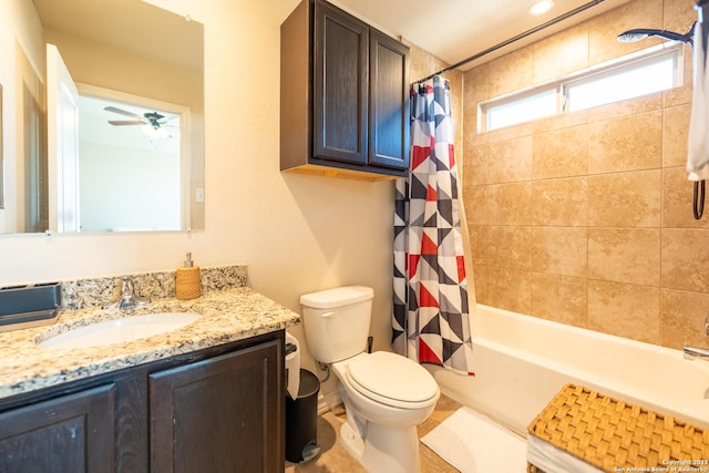 full bathroom with toilet, ceiling fan, shower / tub combo with curtain, and vanity