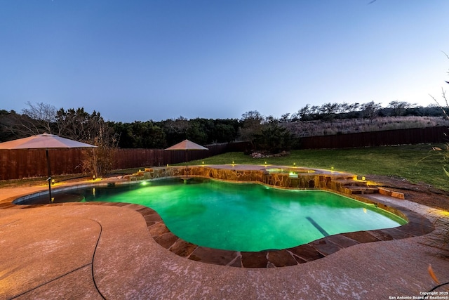 pool at dusk with a fenced in pool, a patio area, and a fenced backyard