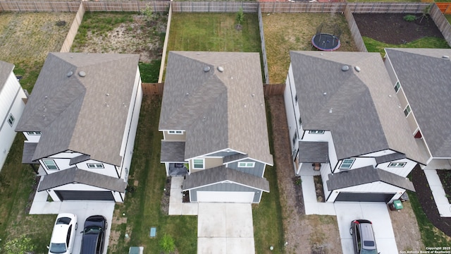 birds eye view of property with a residential view