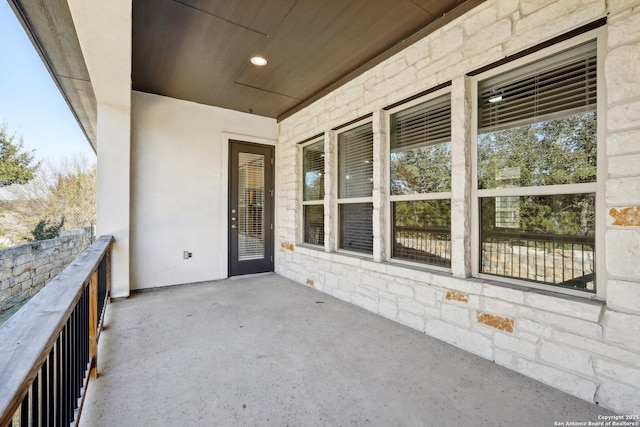 view of patio / terrace with a balcony