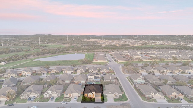 aerial view at dusk with a residential view