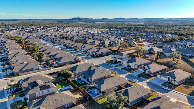 drone / aerial view with a mountain view and a residential view