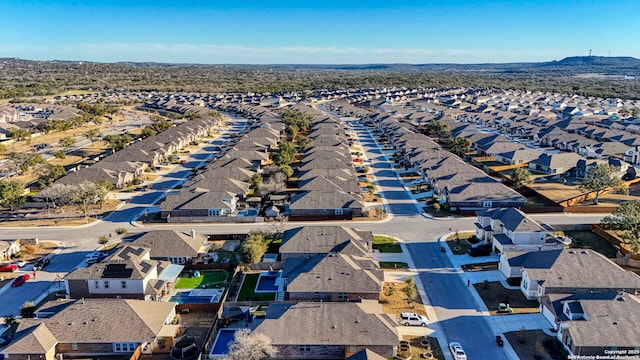 bird's eye view with a residential view and a mountain view