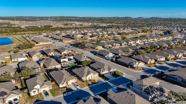 bird's eye view with a mountain view and a residential view