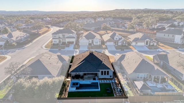 drone / aerial view with a residential view