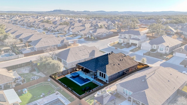 aerial view with a residential view and a mountain view