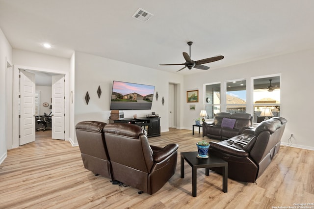 living room with recessed lighting, a ceiling fan, baseboards, visible vents, and light wood-style floors