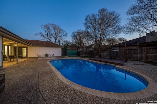 view of swimming pool featuring a patio area and a fenced backyard