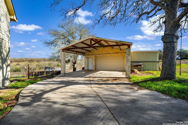 exterior space featuring a detached garage