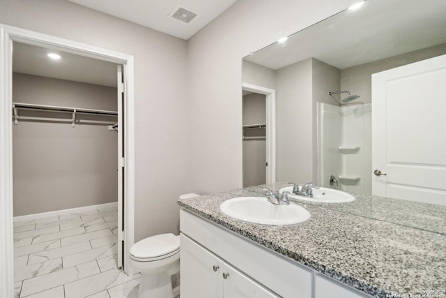 full bath featuring marble finish floor, a spacious closet, visible vents, and walk in shower