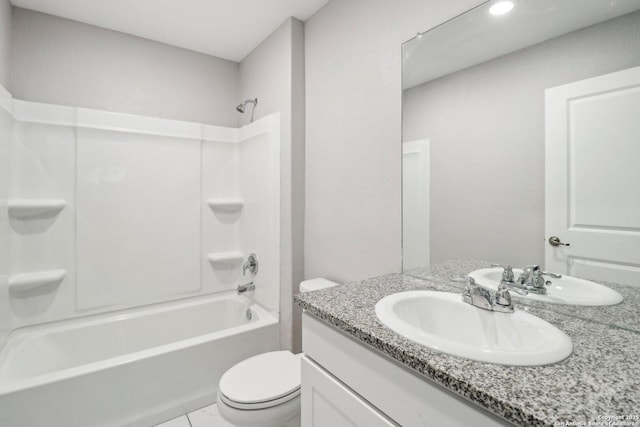 full bath featuring toilet, vanity, and shower / bathing tub combination