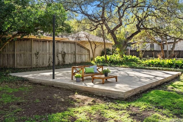 view of yard featuring a patio area and fence