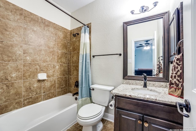 full bath featuring shower / tub combo with curtain, toilet, vanity, baseboards, and tile patterned floors