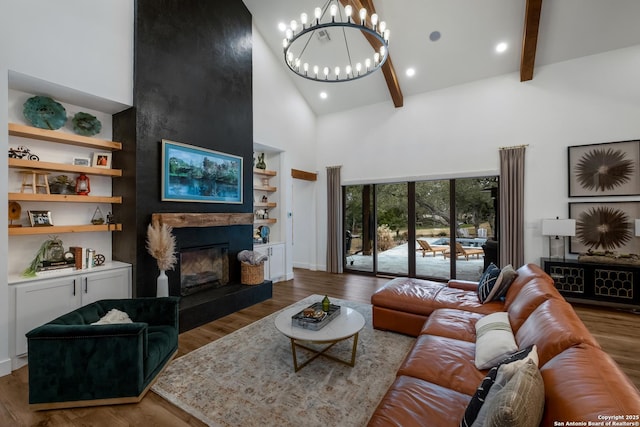 living room featuring high vaulted ceiling, beam ceiling, a fireplace, and wood finished floors