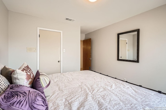 bedroom with visible vents