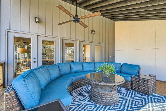 view of patio / terrace with an outdoor living space and a ceiling fan