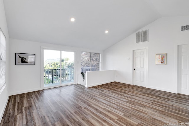 unfurnished living room with recessed lighting, wood finished floors, visible vents, and baseboards