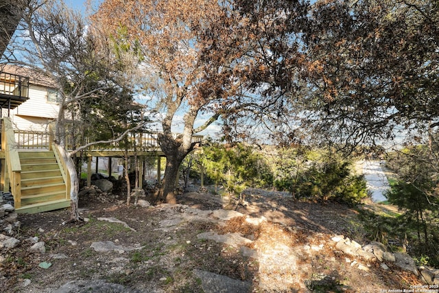 view of yard featuring stairway