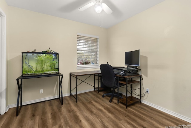 office with dark wood-type flooring, ceiling fan, and baseboards