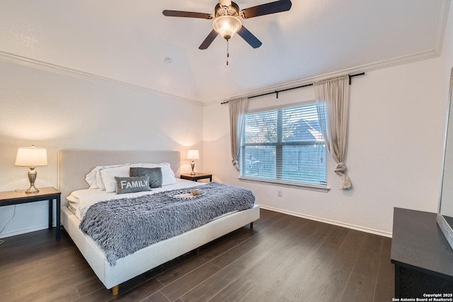 bedroom with vaulted ceiling, dark wood-style flooring, a ceiling fan, and baseboards