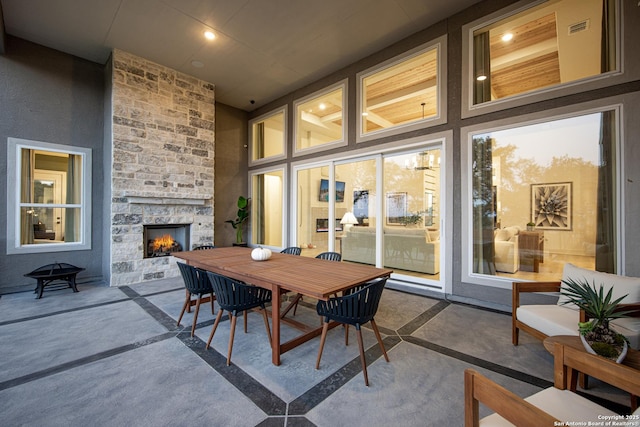 interior space featuring a fireplace and visible vents