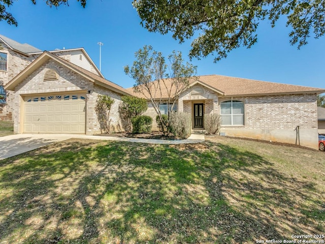 single story home with a garage, driveway, brick siding, and a front yard