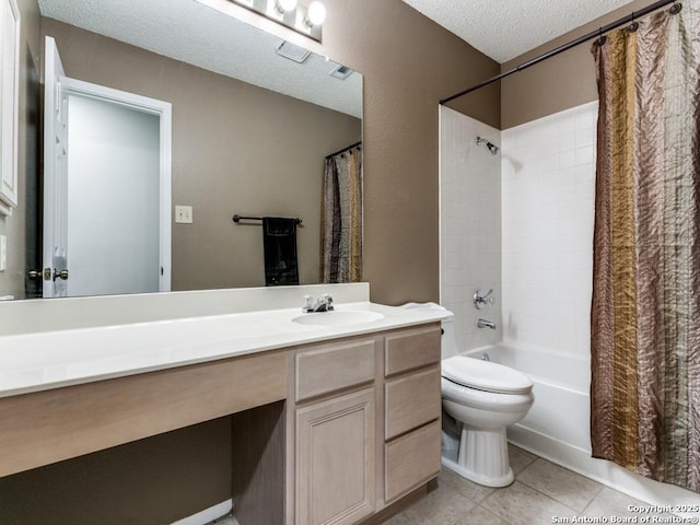 full bath with a textured ceiling, toilet, vanity, tile patterned floors, and shower / bathtub combination with curtain