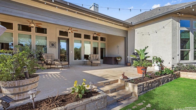 exterior space with ceiling fan, a patio area, and stucco siding