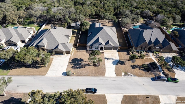 birds eye view of property with a residential view