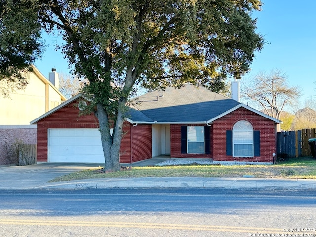 ranch-style house with a garage, brick siding, fence, concrete driveway, and a chimney