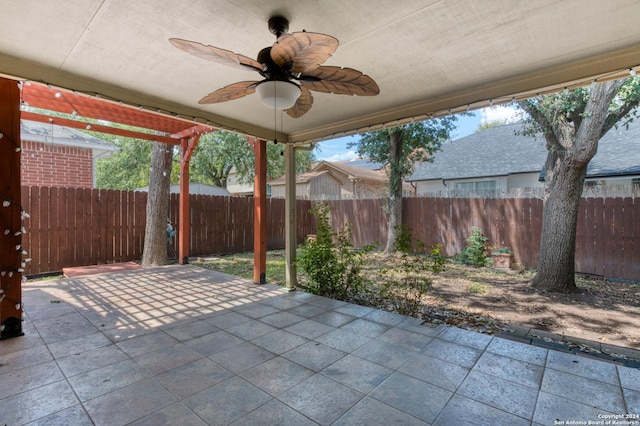 view of patio with a ceiling fan and a fenced backyard