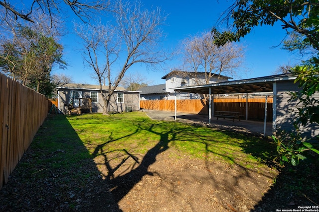 view of yard with a patio and a fenced backyard