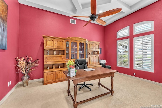 office space with coffered ceiling, visible vents, light carpet, and baseboards